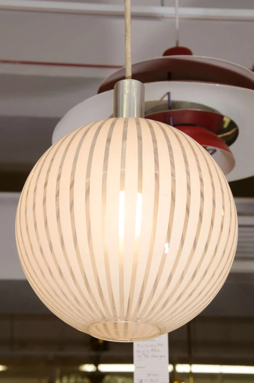 An Italian Clear Glass Globe Pendant with White Stripes