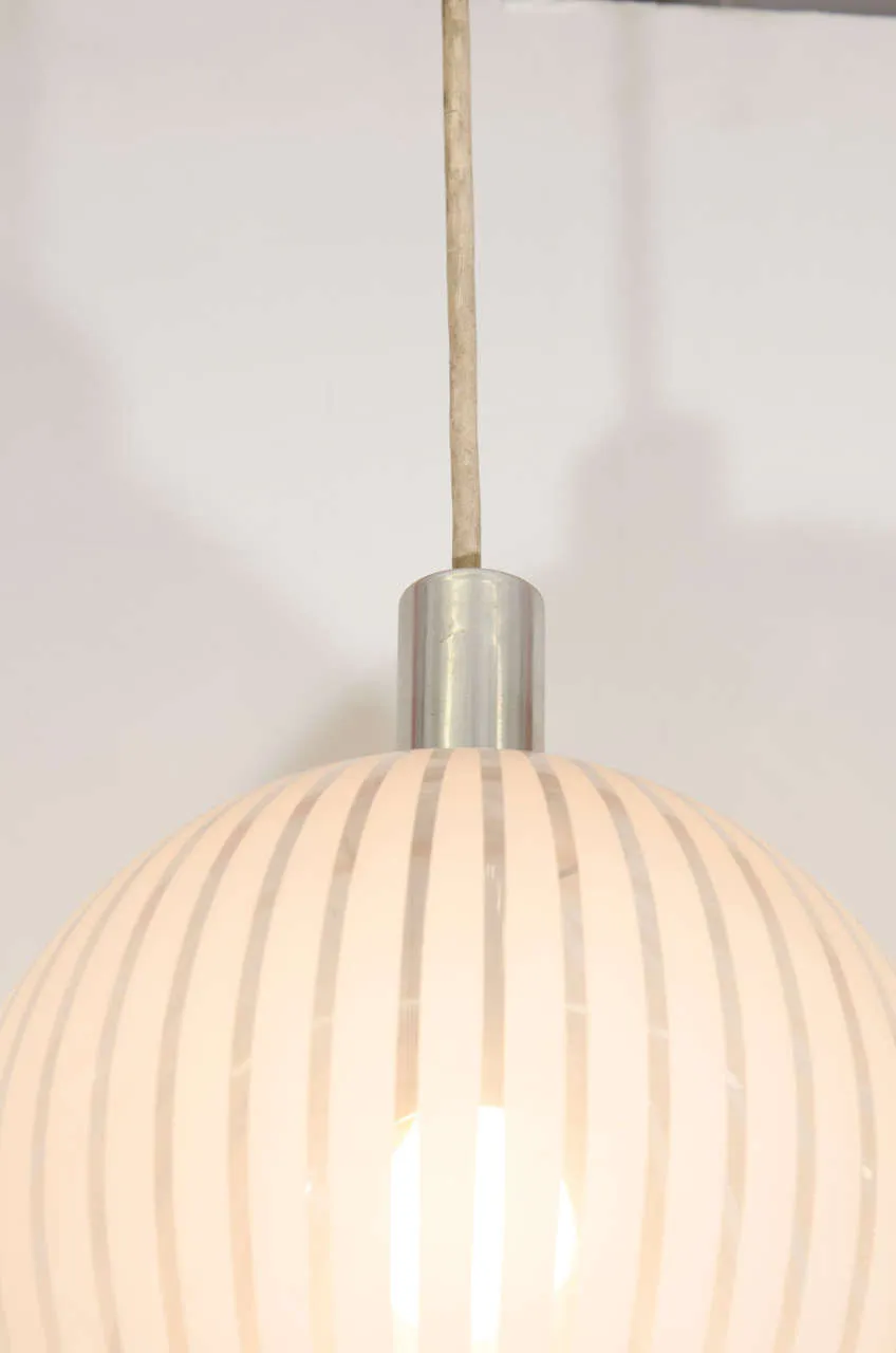 An Italian Clear Glass Globe Pendant with White Stripes