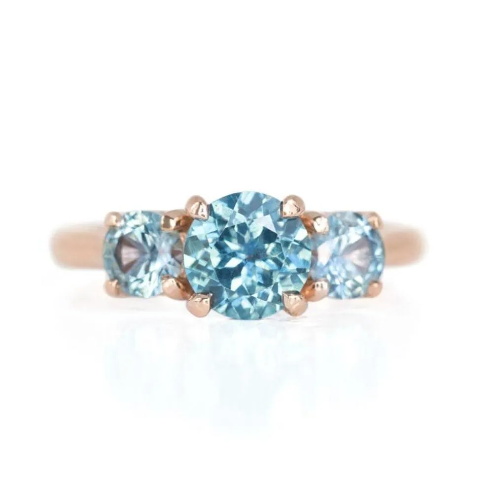 Three Stone Montana Sapphire Ring with 1.27ct Blue Center in 14k Rose Gold